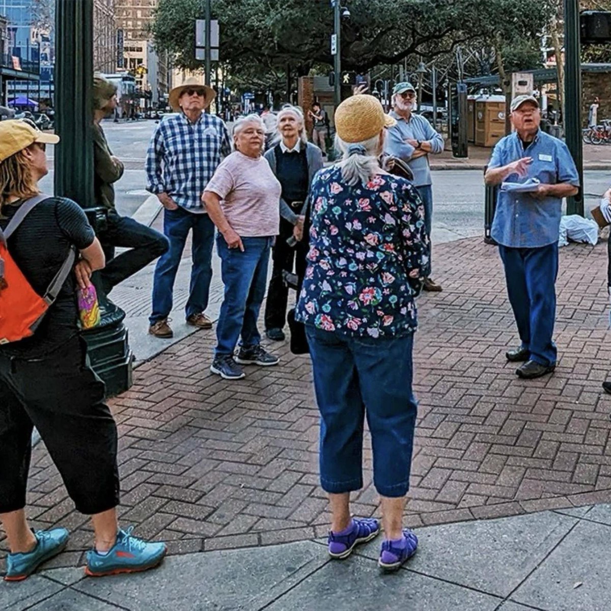 A Preservation Houston docent leading an Architecture Walk through downtown Houston
